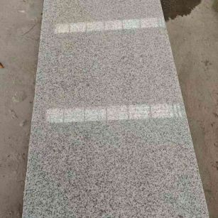 兰州芝麻白光面毛板